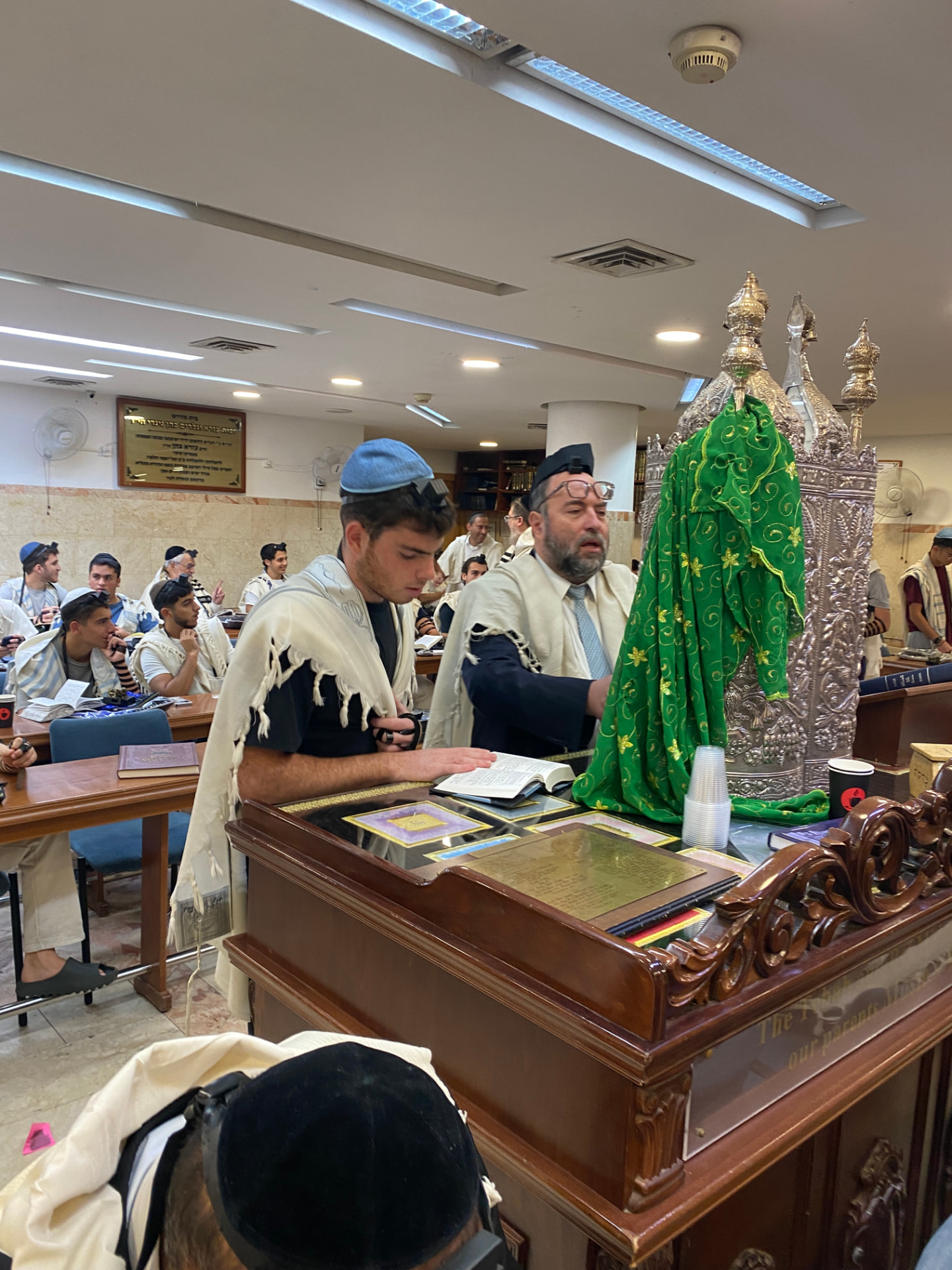 Shacharit at the amud beside the Sefer Torah in the Bet Medrash