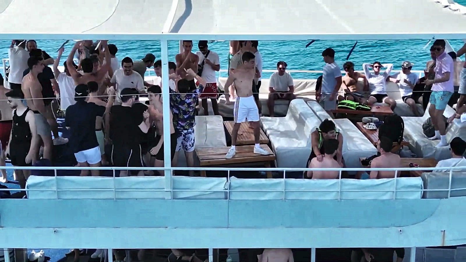 Talmidim gathered on the deck during a boat trip