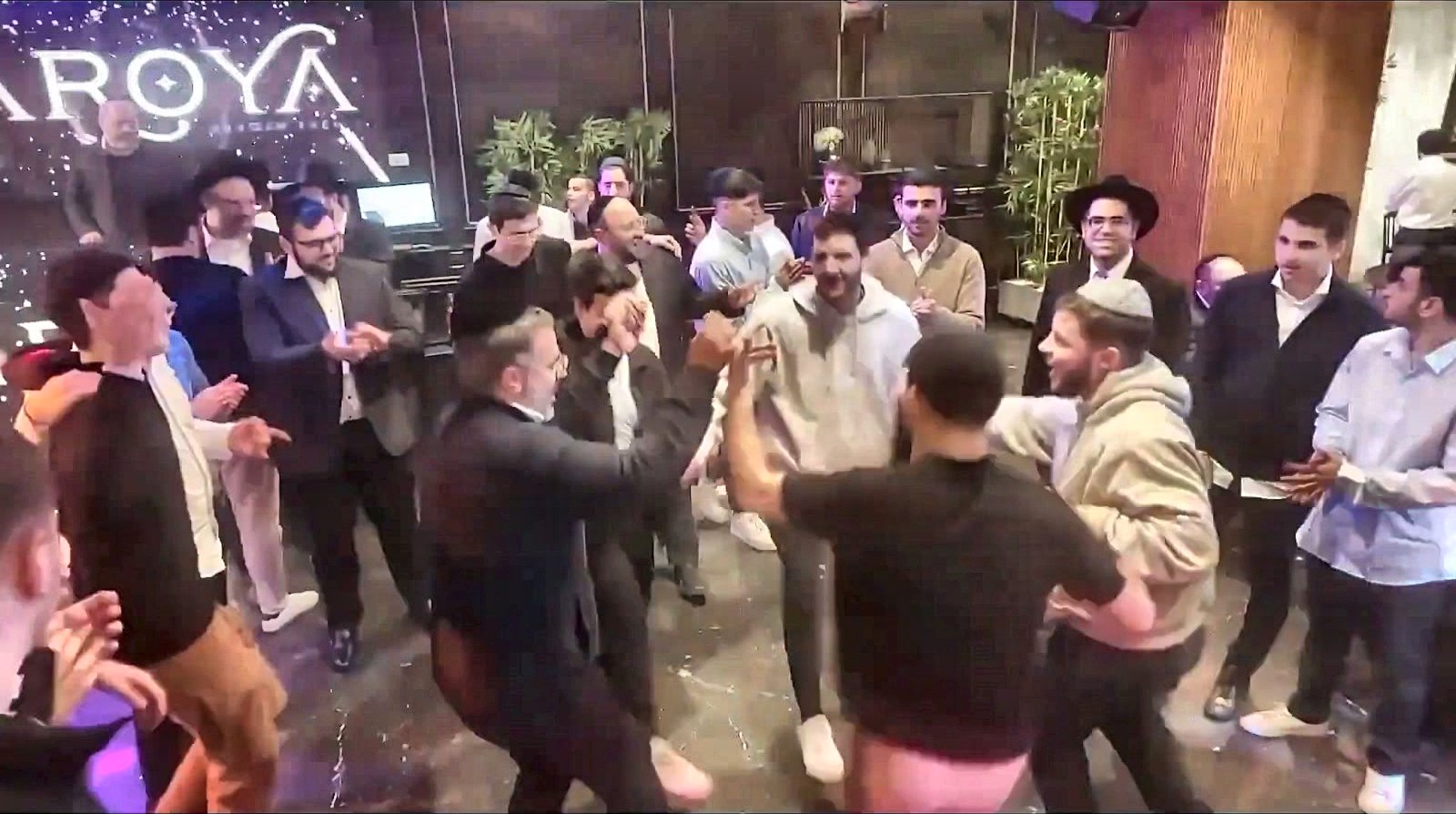 Talmidim dancing together at a simcha