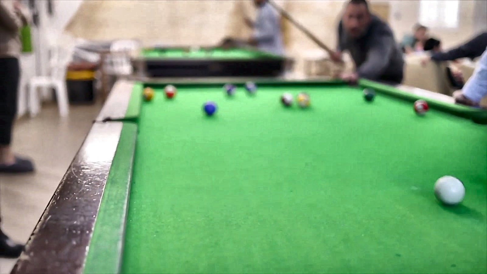 Talmidim playing pool in the game room