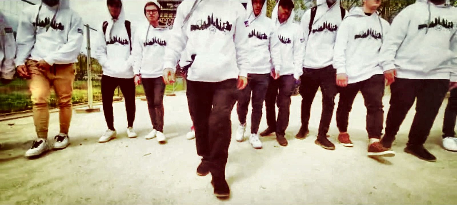 Talmidim walking together in matching yeshiva sweatshirts