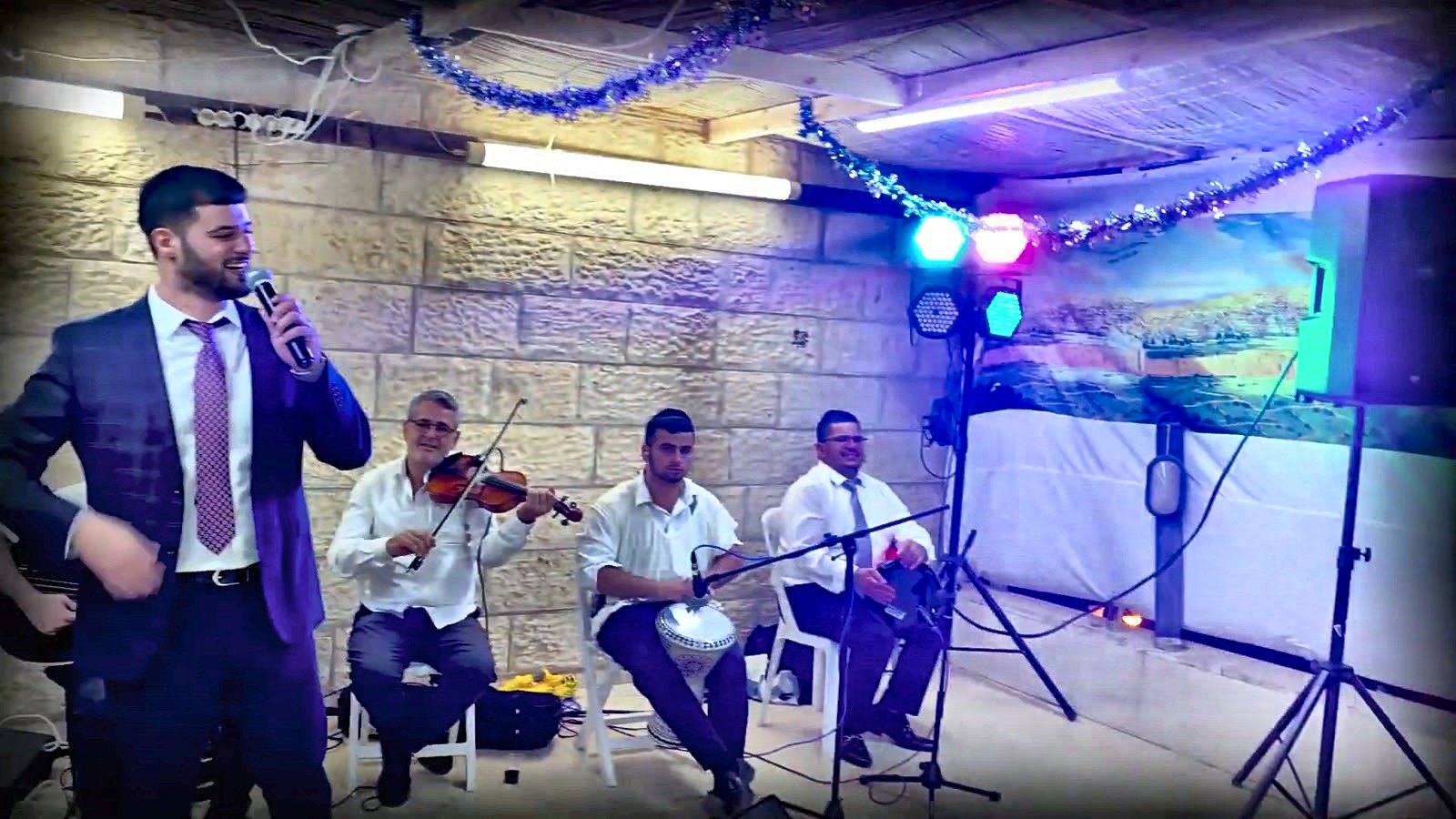 Live music and violin at a yeshiva celebration