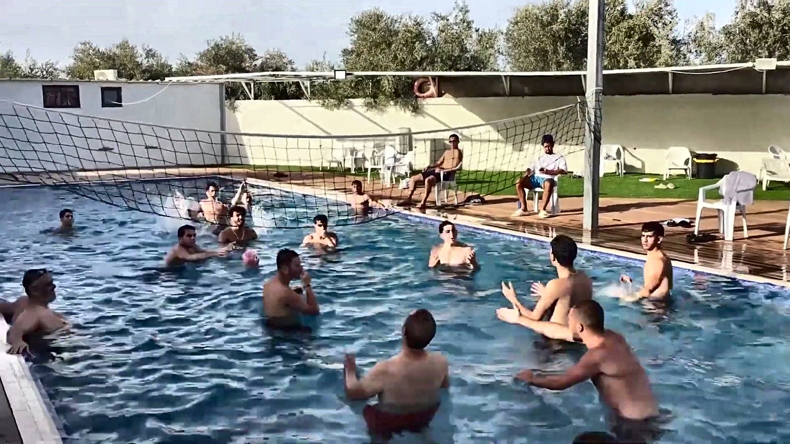 Talmidim swimming together at the pool