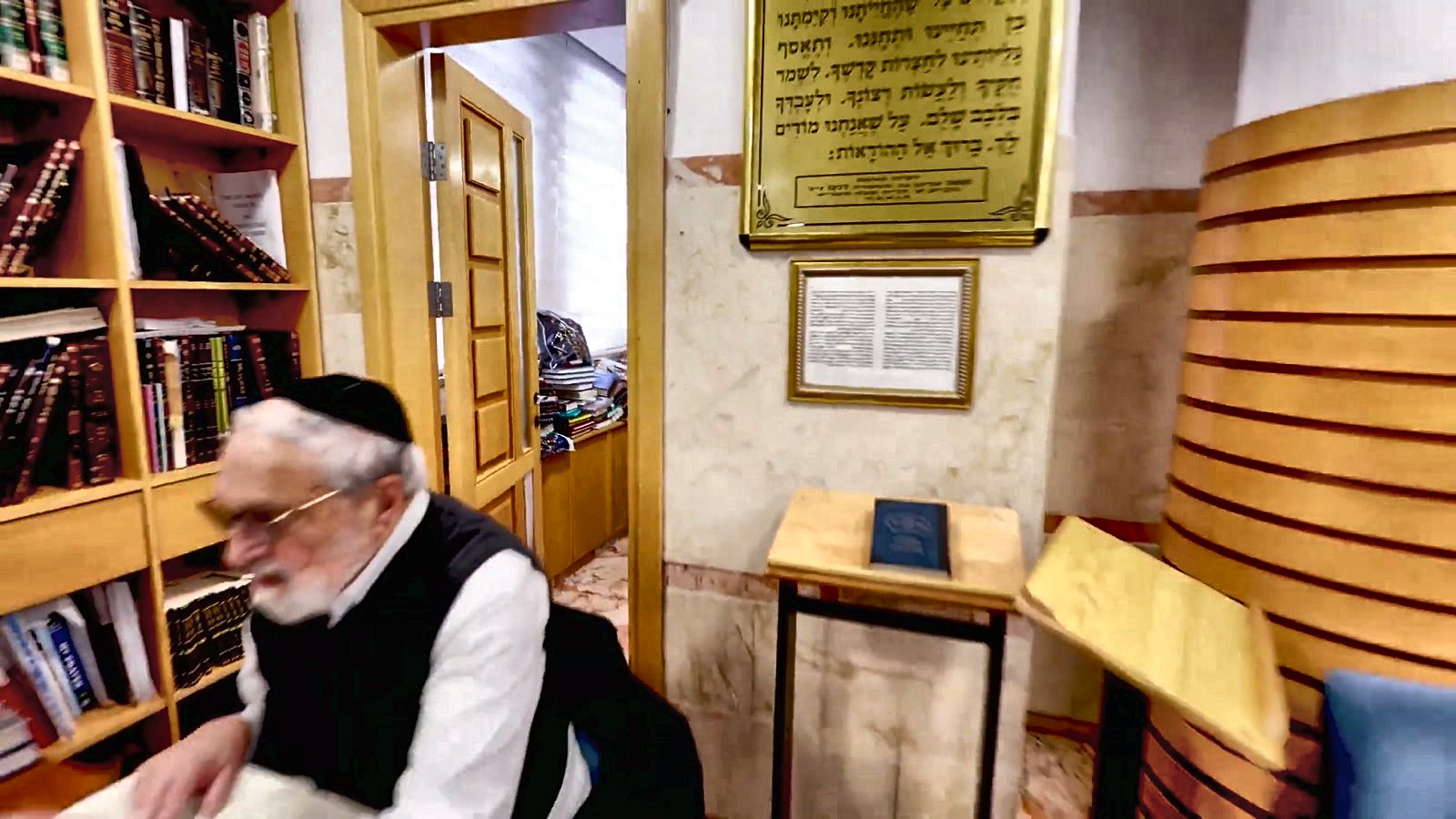 A rav in the yeshiva library among the sefarim