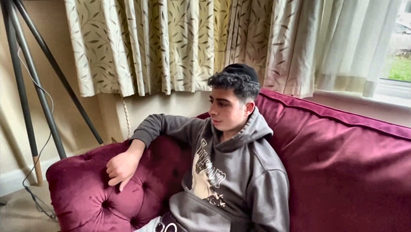 A talmid relaxing in the dorm
