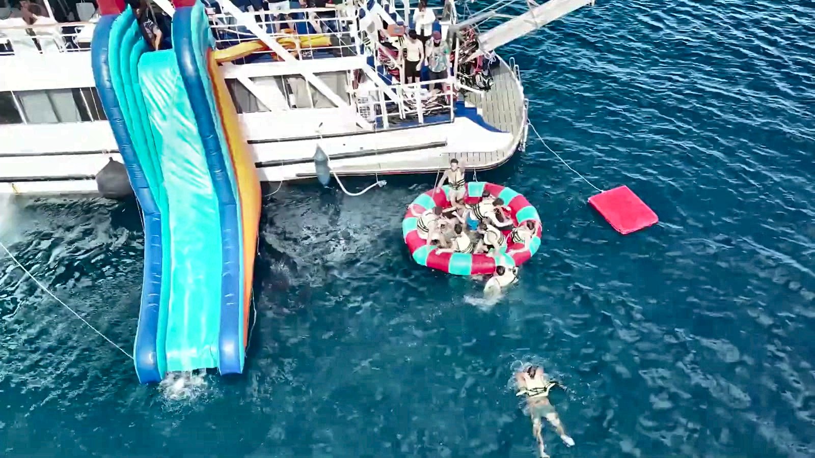 A water slide off the boat on a summer trip